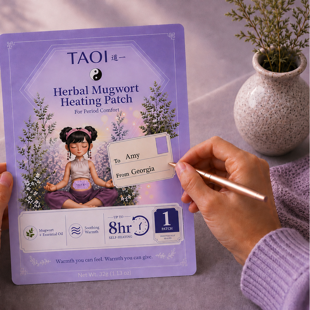TAOI Herbal Mugwort Heating Patch packaging held by a person writting names on a note sticker with a decorative background